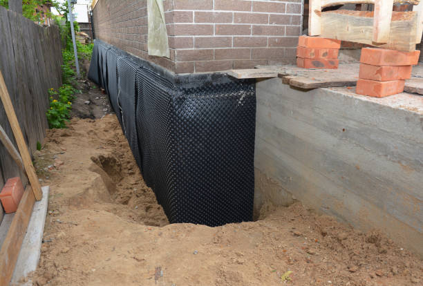 Happy homeowners after waterproofing job in Sperryville